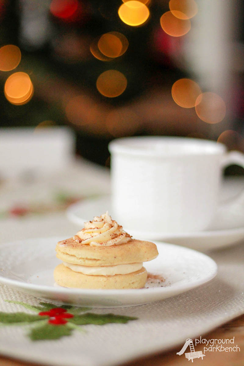 A bundle of holiday flavors wrapped up into one cookie in this festive, Christmas twist on a traditional sugar cookie! Eggnog, nutmeg and bourbon cream are sure to please your tastebuds from Christmas through the New Year! | Cookies | Christmas Cookies | Holiday Baking | Recipe | Eggnog | 