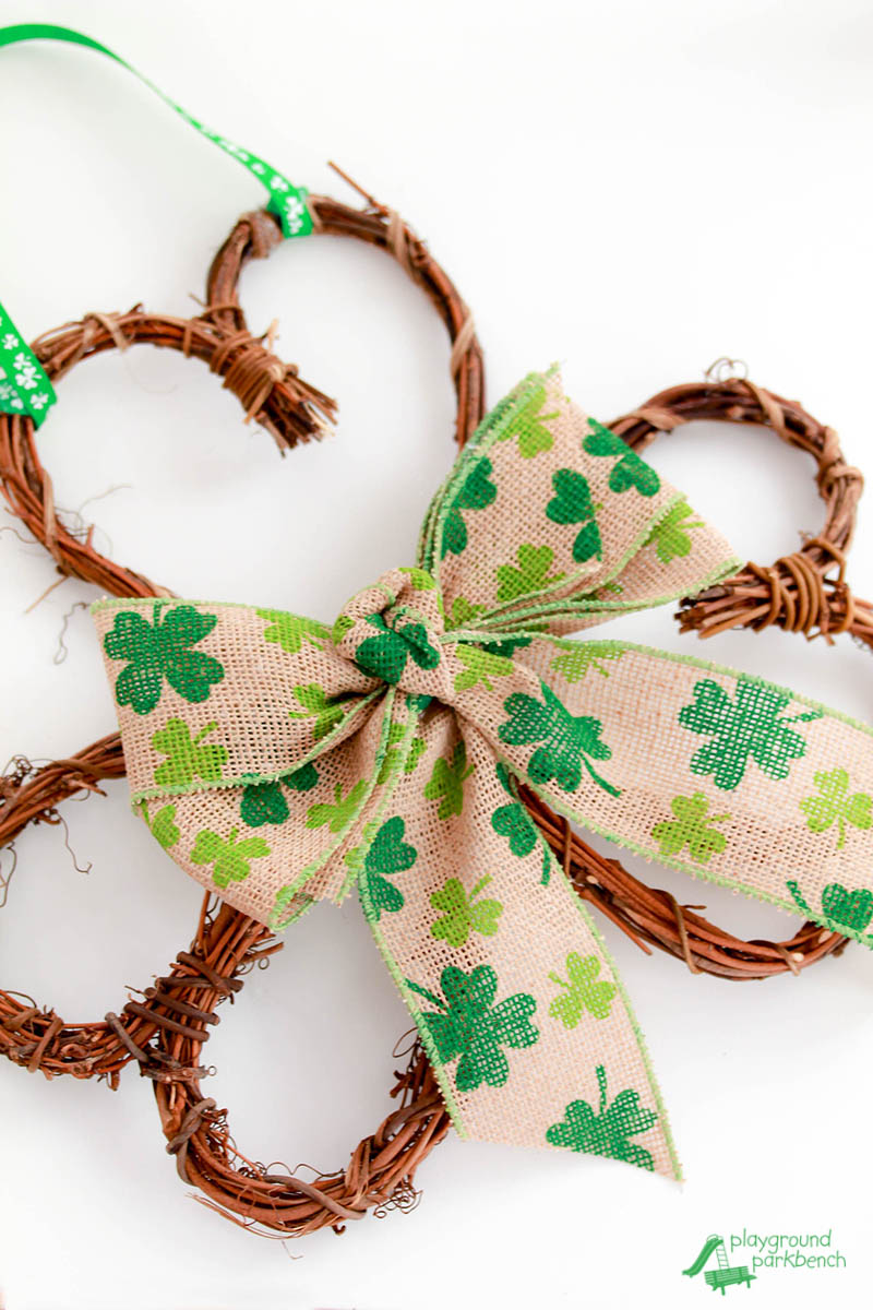 Turn grapevine hearts into this quick and easy DIY Shamrock Wreath - the perfect lucky St. Patrick's Day decor for your home. 