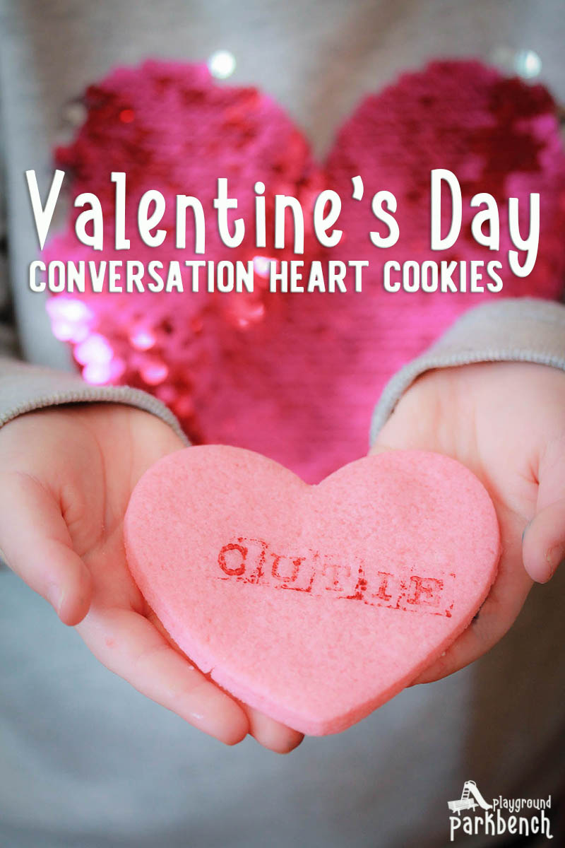 Stamped Conversation Heart Sugar Cookies made by kids in child's hands